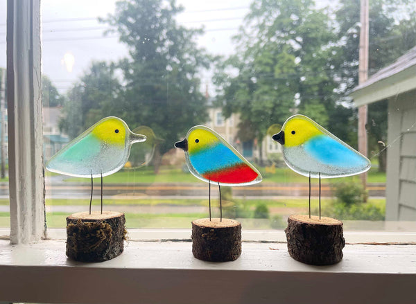 Load image into Gallery viewer, three colourful handcrafted fused glass chicks on a window ledge