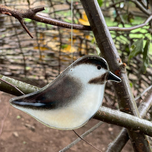 Adult grey, white and black fused glass hanging chickadee in nature