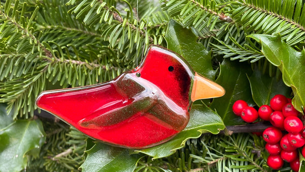 Load image into Gallery viewer, A red handcrafted fused glass cardinal in a green scarf.