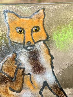 Close up of the stylized fused glass fox picture