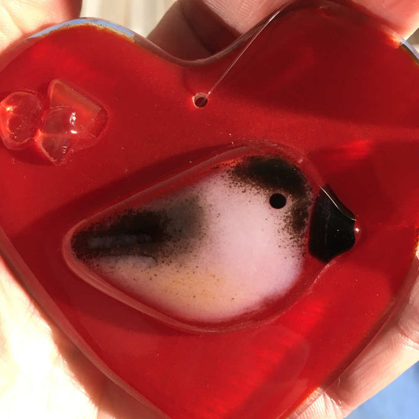 Charger l'image dans la galerie, A close up of a red Fused Glass Heart with Chickadee in Hand