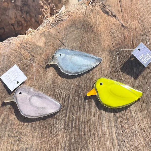 Charger l'image dans la galerie, Three colourful glass hanging chicks on a log slice