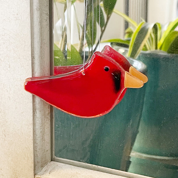 Charger l'image dans la galerie, Red cardinal bird-shaped ornament hanging on a mirror