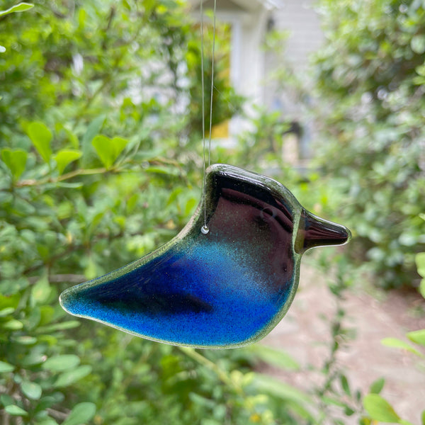 Load image into Gallery viewer, blue and black glass stellers jay hanging chick with nature