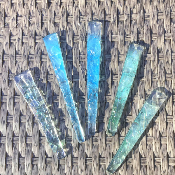 Load image into Gallery viewer, Fused Glass Christmas Icicles sit on a grey table