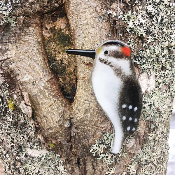 Load image into Gallery viewer, Black and white bird with red head and long pointed beak. Hairy Woodpecker glass ornament