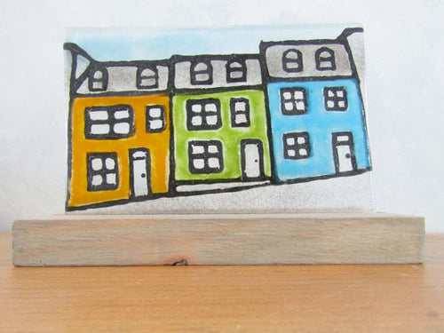 glass tile with colourful house design reminiscent of Lunenburg and the East Coast of Canada