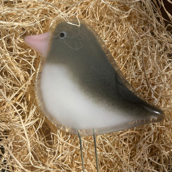 Load image into Gallery viewer, Fused Glass Grey and White Junco Bird Ornament on a nest of wood fibre

