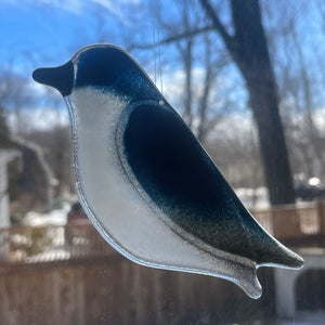Handcrafted Blue and White Fused Glass Hanging Tree Swallow in a window