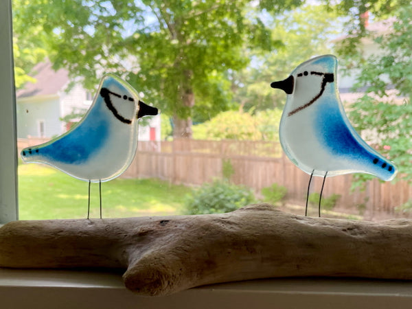 Load image into Gallery viewer, Pair of Blue and White perched Glass Blue Jays on Driftwood, posed on a window sill
