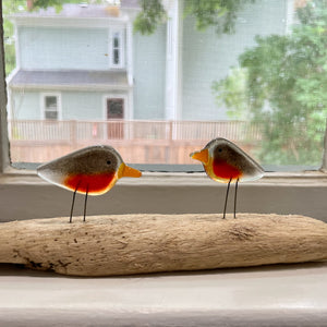 Pair of Fused Glass Pocket Robins on Driftwood, placed on window sill