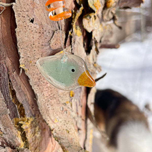 Load image into Gallery viewer, Decorative bird ornament hanging on a tree branch
