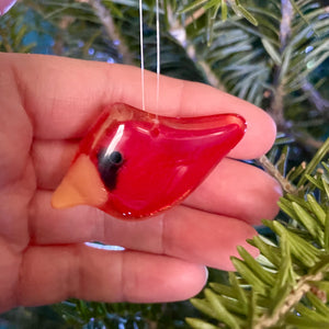 Small glass cardinal with artisans hand for scale