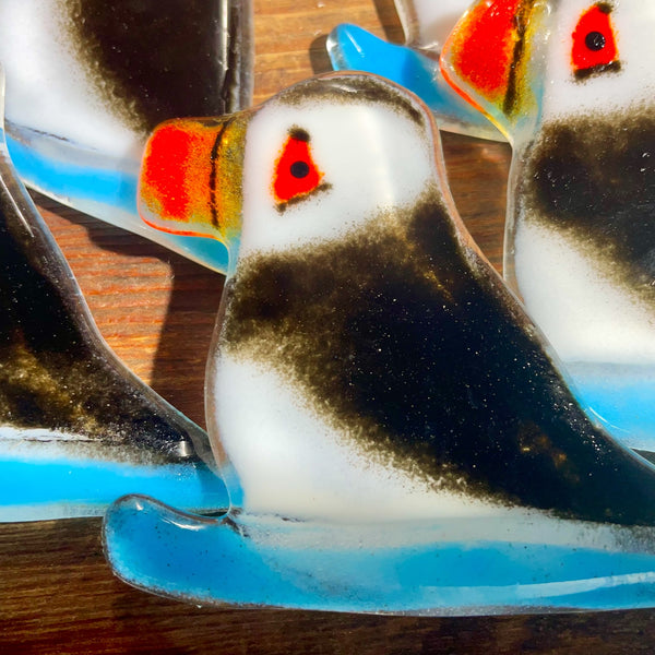 Load image into Gallery viewer, handcrafted glass puffin on blue sled

