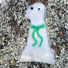 Load image into Gallery viewer, Glass polar bear wearing a green scarf, with a backdrop of a Birch Tree
