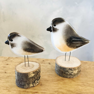 A large and small glass Black Capped Chickadee 