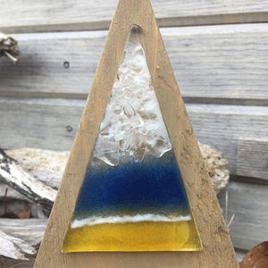 A beach coloured fused glass Christmas Tree on a Triangular backboard