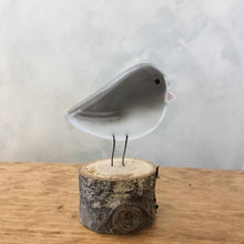 Load image into Gallery viewer, A grey and white glass bird ornament with a pink beak (Dark Eyed Junco).
