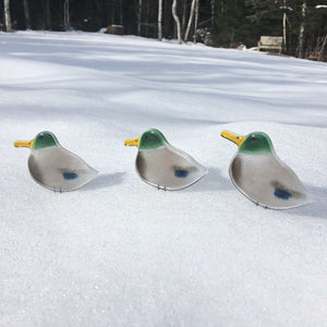 Three Glass Mallard Duck Ornaments in the snow