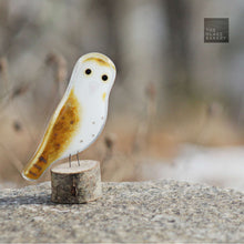 Load image into Gallery viewer, Glass Barn Owl ornament sits on a rock
