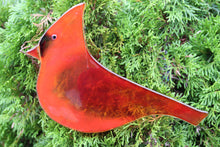 Load image into Gallery viewer, Large red glass cardinal bird hanging art piece, with cedar tree in background
