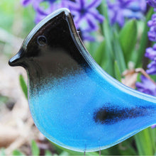 Load image into Gallery viewer, Blue and Black Glass bird with hyacinth in background
